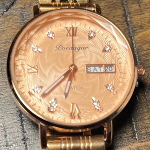A Poedagar Rose Gold Watch with Date Display